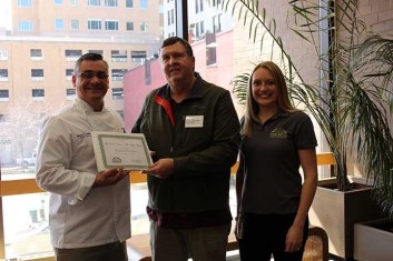 Chris Carton, Food and Beverage Director and Executive Chef; Pete Vogel, Food Rescue Partnership; and Christina McDonough, Food Rescue Partnership